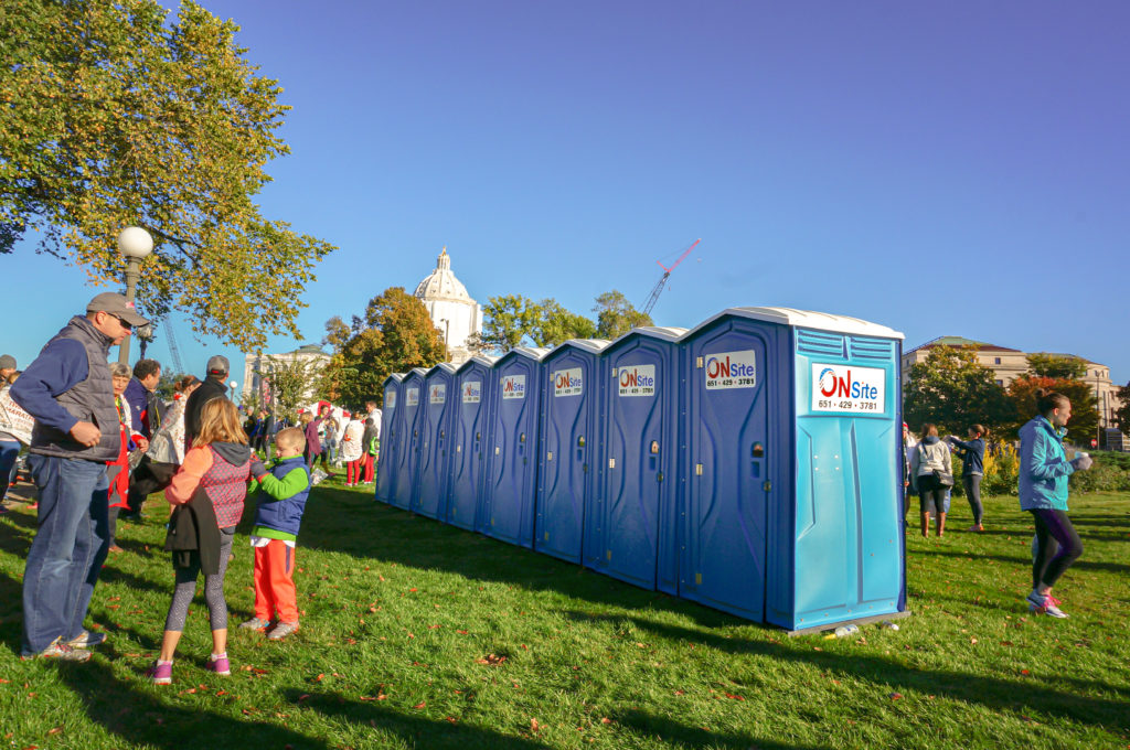 Portable restrooms in front of capital building